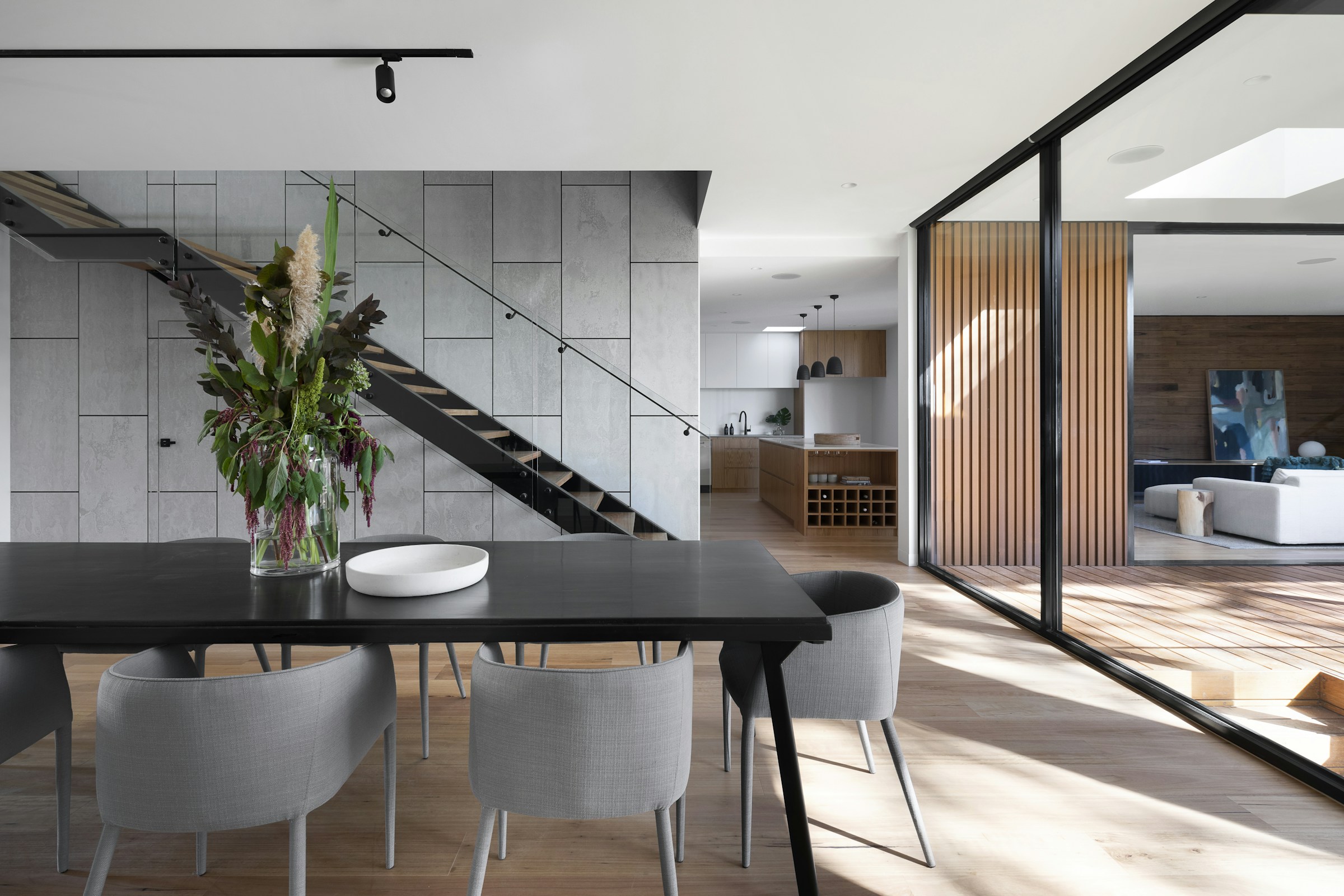 Contemporary home with deep overhangs and open living spaces